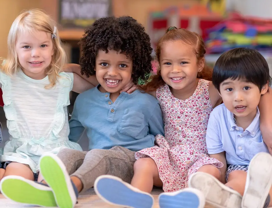 Programs 2 Happy children in class