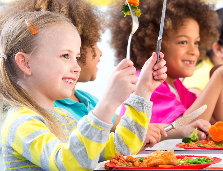 Children enjoying healthy meal